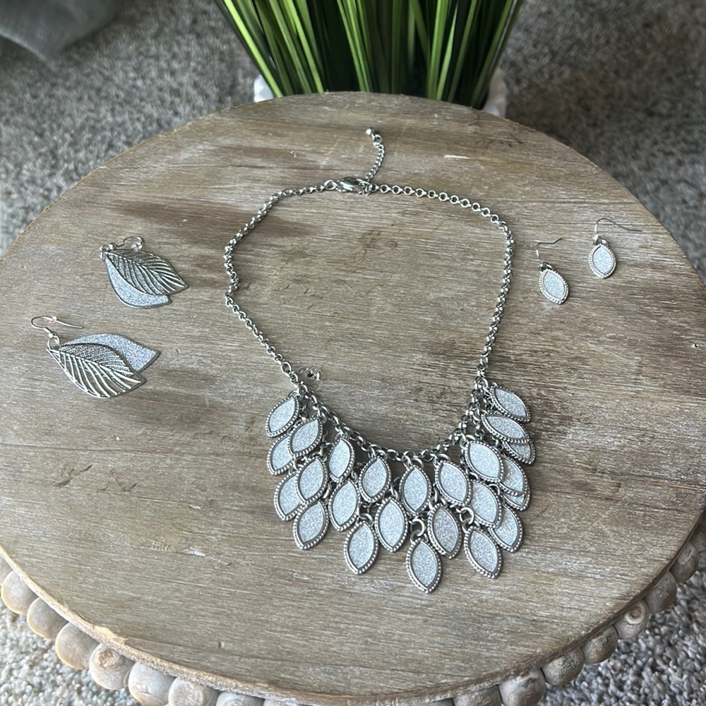 Statement necklace and two sets of earrings. Worn MAYBE once. Charming Charlie.